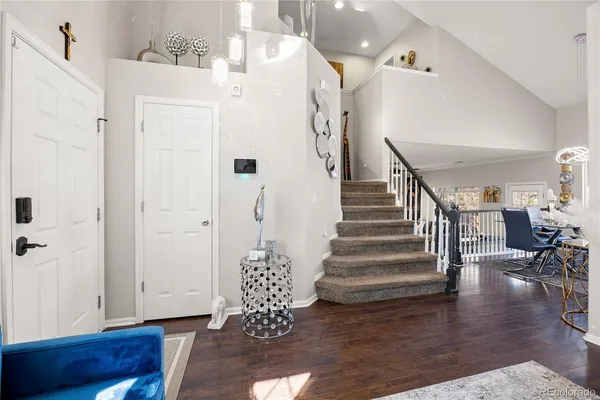 a view of entryway with wooden floor