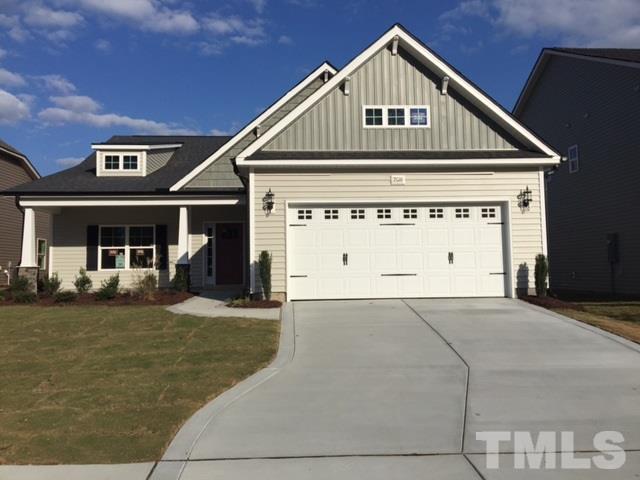 2016 Temple Hills Way Fuquay-Varina, NC 27526 - Photo 2 of 13 a front view of a house with a yard