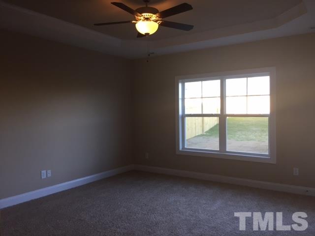 2016 Temple Hills Way Fuquay-Varina, NC 27526 - Photo 10 of 13 an empty room with a window
