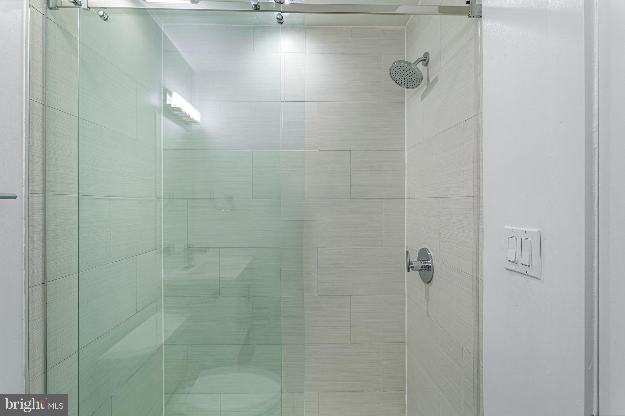 1219 K Street Northeast, Unit 202 Washington, DC 20002 - Photo 7 of 15 a bathroom with a shower