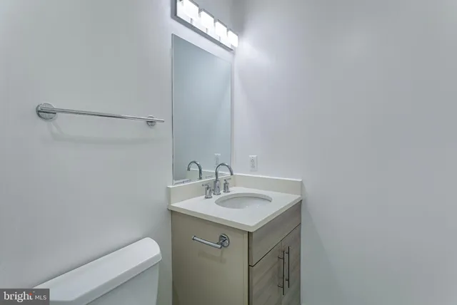 a bathroom with a sink and a toilet