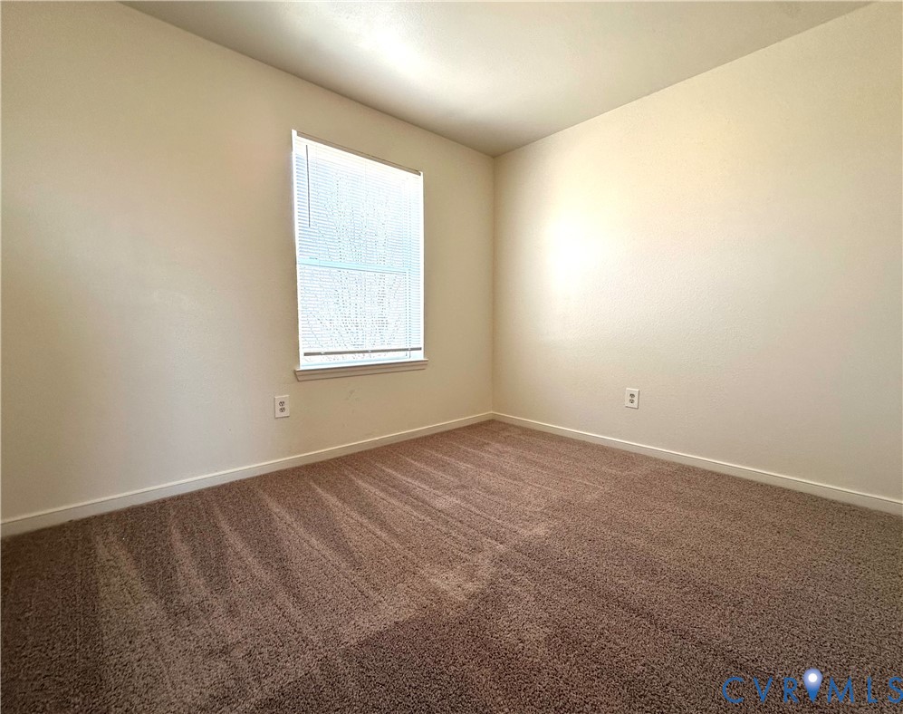 3510 East Richmond Road, Unit U12 Richmond, VA 23223 - Photo 14 of 26 an empty room with a window