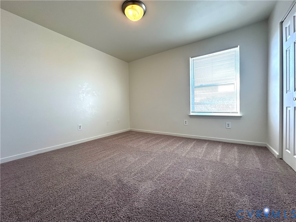 3510 East Richmond Road, Unit U12 Richmond, VA 23223 - Photo 15 of 26 an empty room with a window