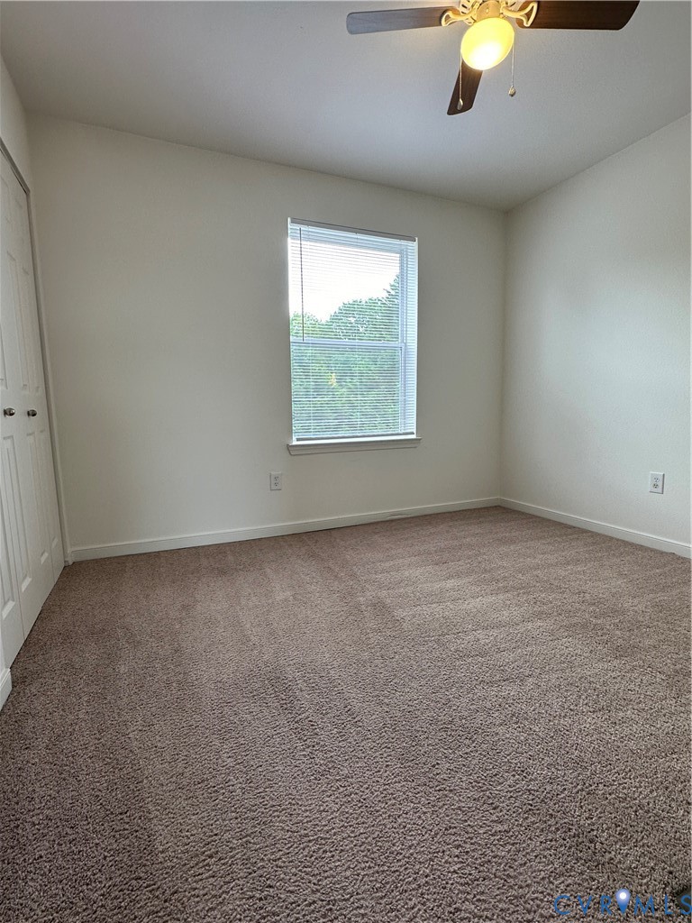 3510 East Richmond Road, Unit U12 Richmond, VA 23223 - Photo 7 of 26 an empty room with a window