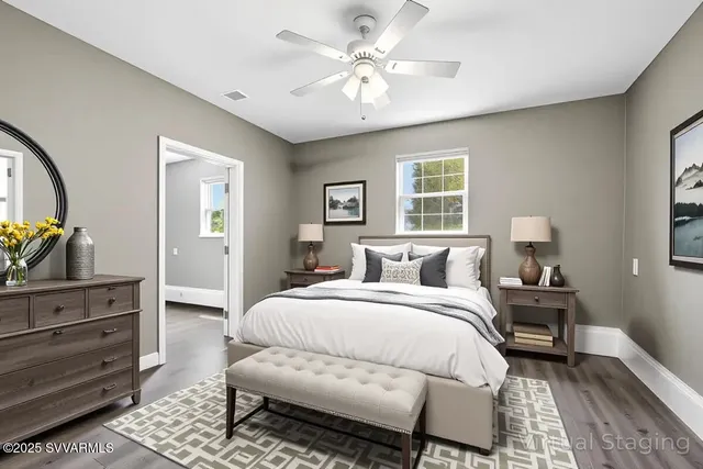 a bedroom with a bed and a dresser