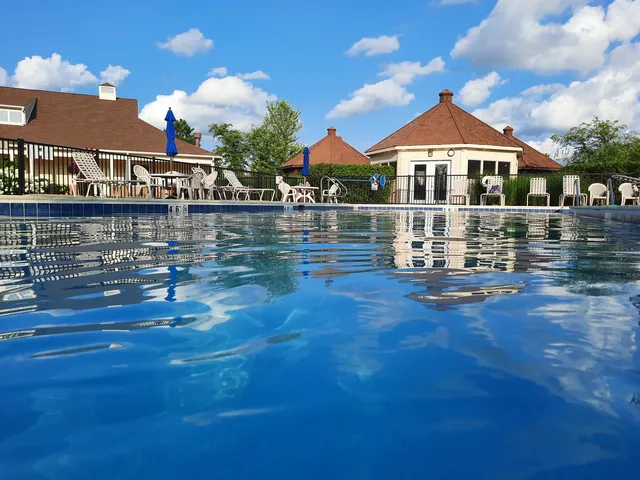 a front view of a house with swimming pool