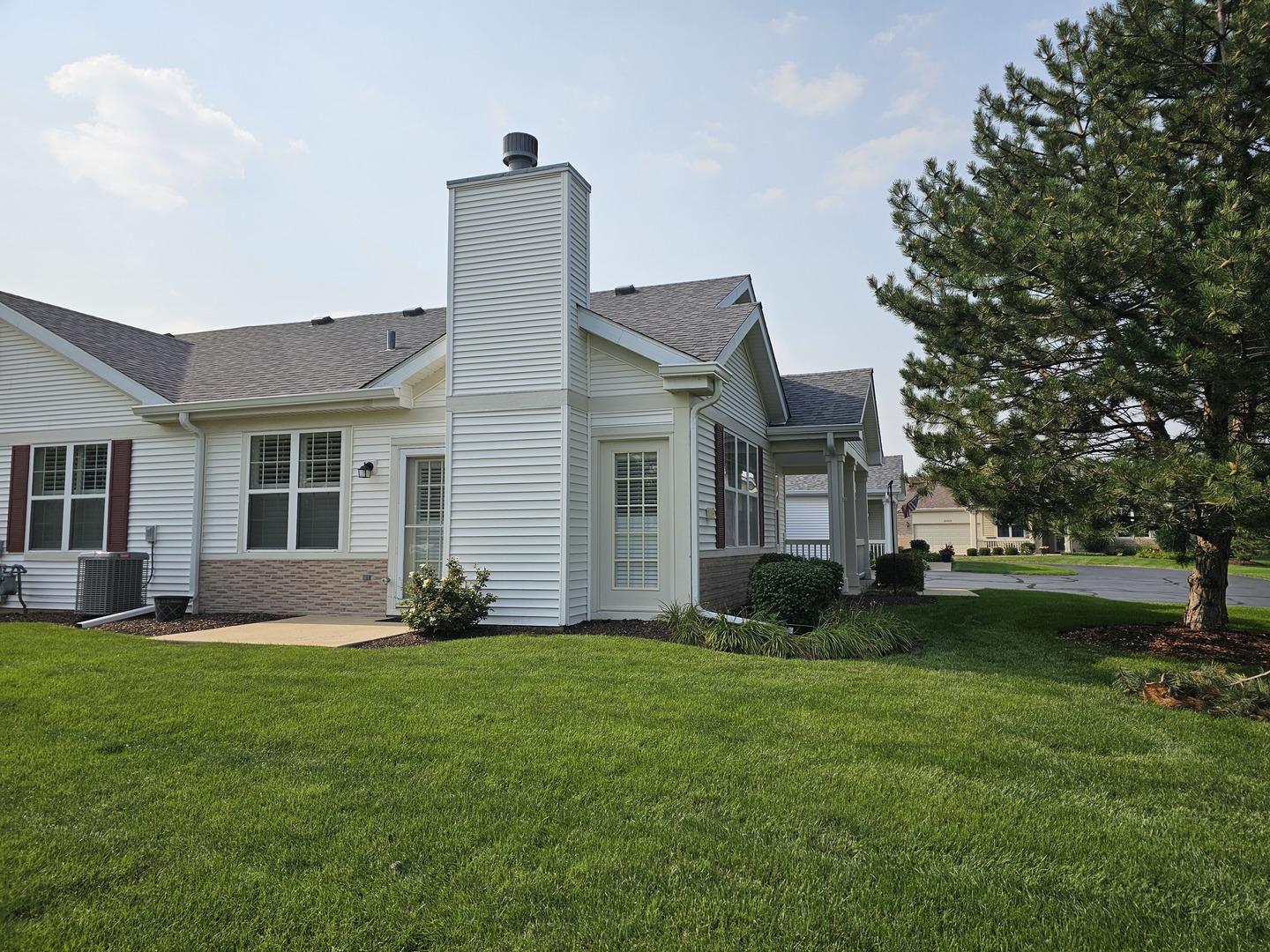 16613 Buckner Pond Way Crest Hill, IL 60403 - Photo 2 of 20 a front view of house with yard and green space