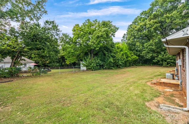 a view of a yard with an outdoor space