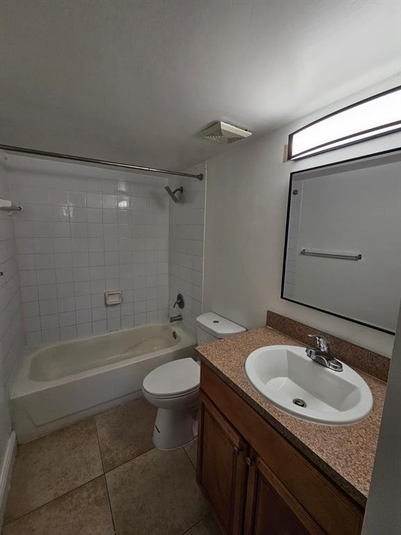 12118 St Andrews Place, Unit 108 Miramar, FL 33025 - Photo 15 of 15 a bathroom with a sink toilet a mirror and shower