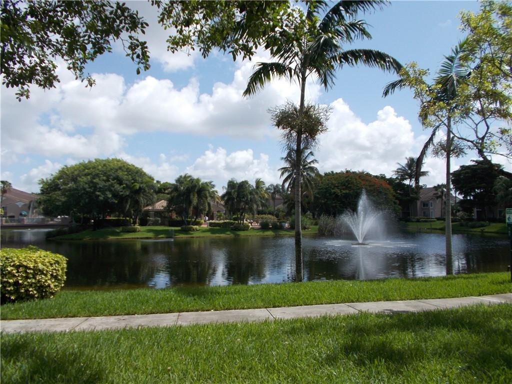 12118 St Andrews Place, Unit 108 Miramar, FL 33025 - Photo 3 of 15 a view of a lake