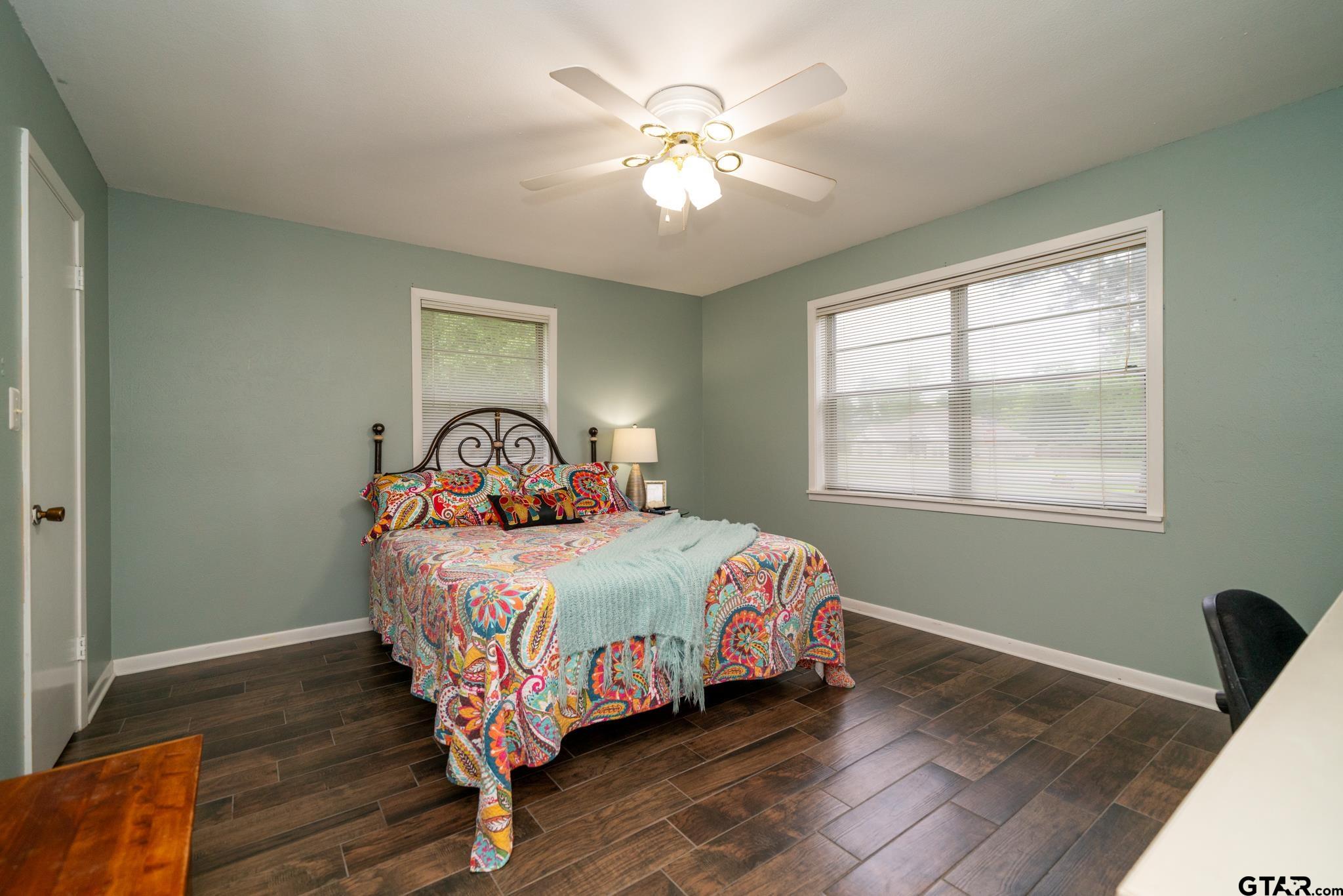 102 Randal Lane Pittsburg, TX 75686 - Photo 13 of 42 a bedroom with a bed and a window