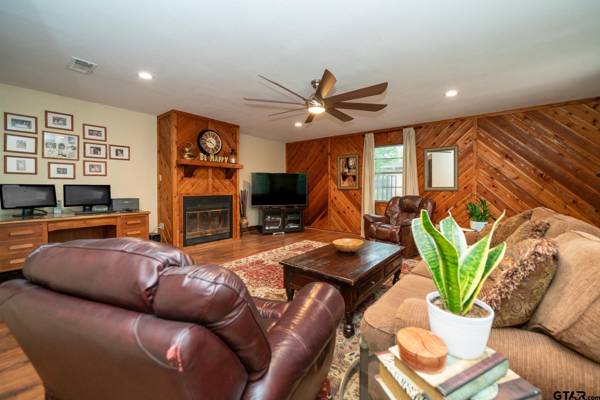 102 Randal Lane Pittsburg, TX 75686 - Photo 20 of 42 a living room with furniture kitchen view and a large window