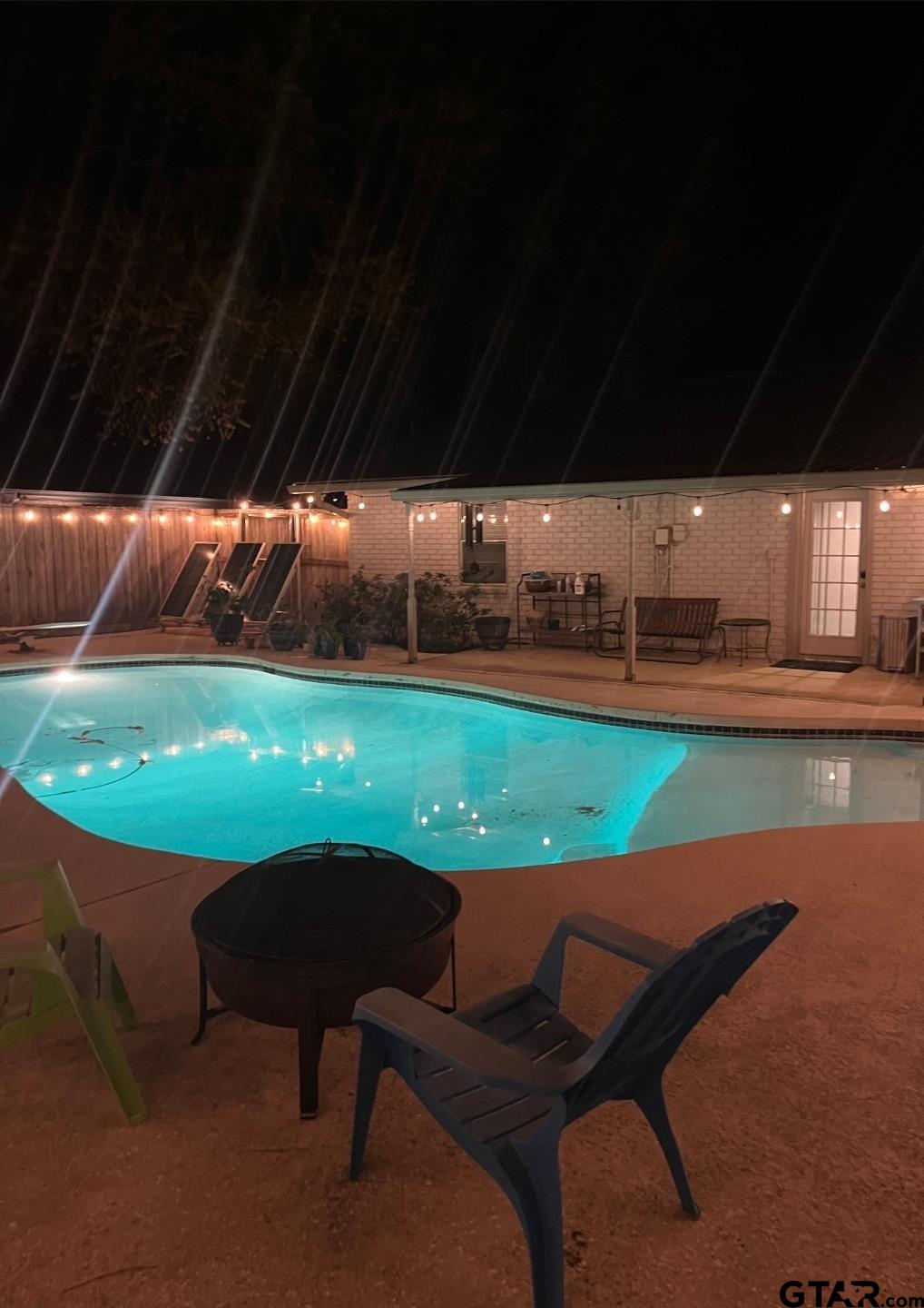 102 Randal Lane Pittsburg, TX 75686 - Photo 5 of 42 a view of a backyard with sitting area