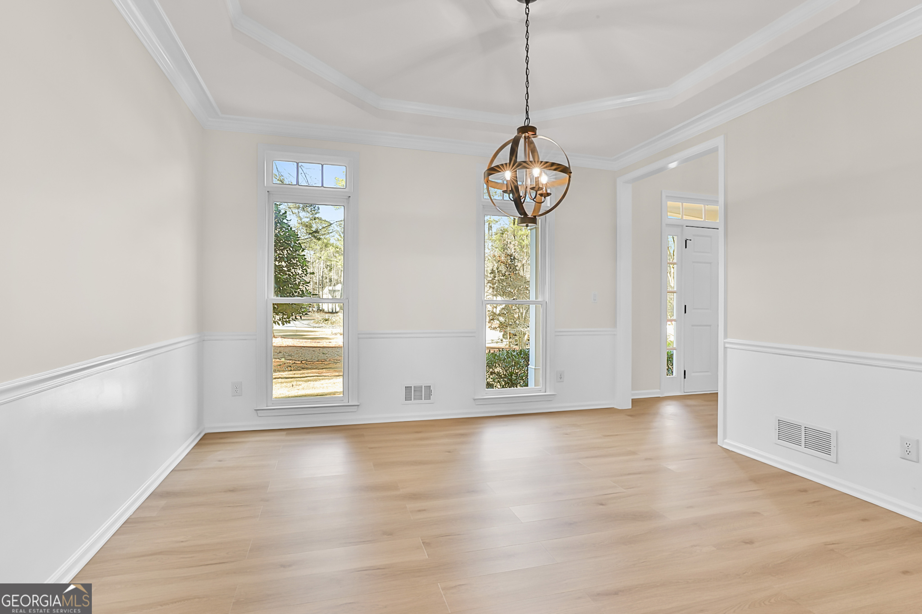 160 Streamview Court Fayetteville, GA 30215 - Photo 15 of 55 a view of an empty room with a window and wooden floor