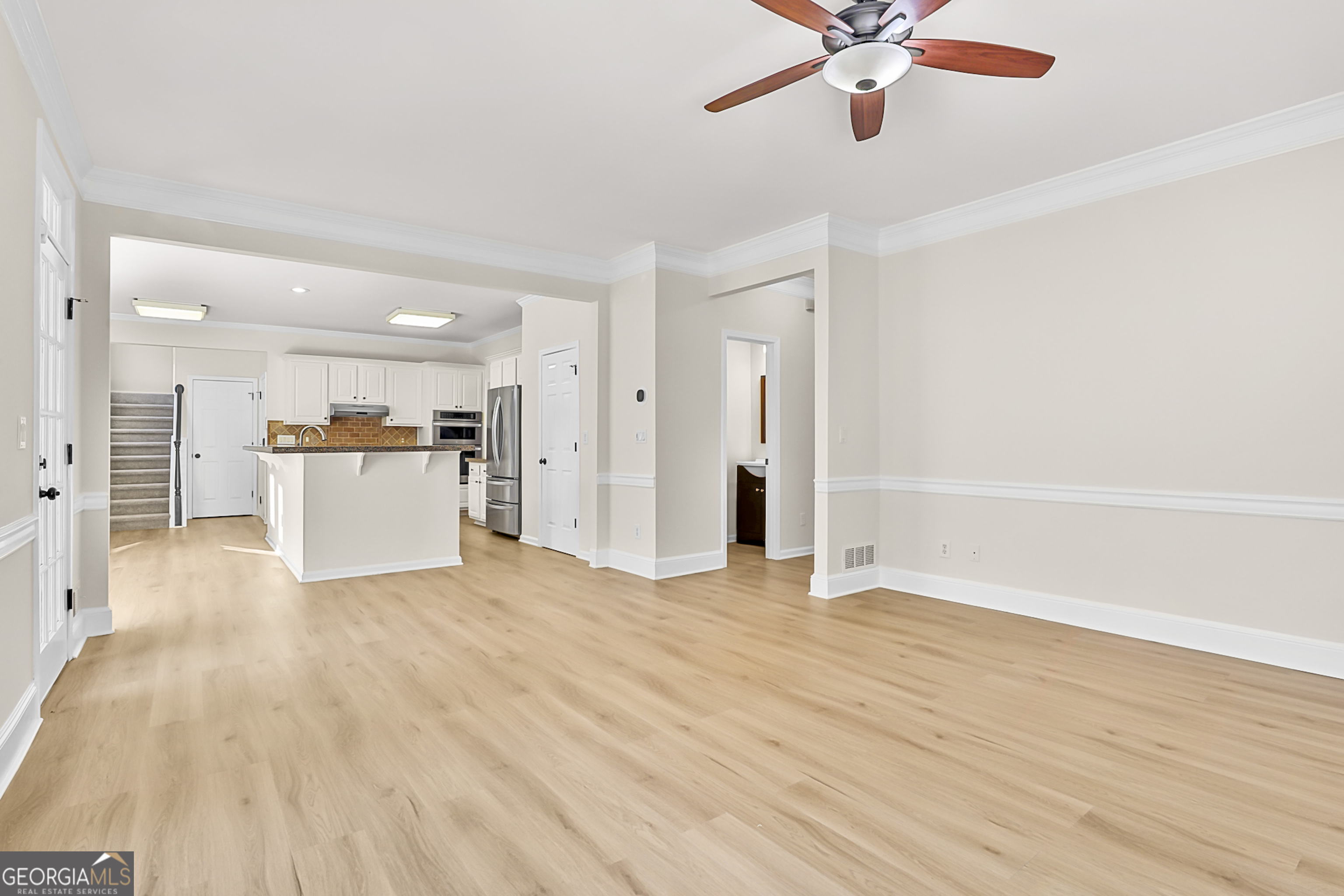 160 Streamview Court Fayetteville, GA 30215 - Photo 20 of 55 a view of a kitchen with a sink and a refrigerator