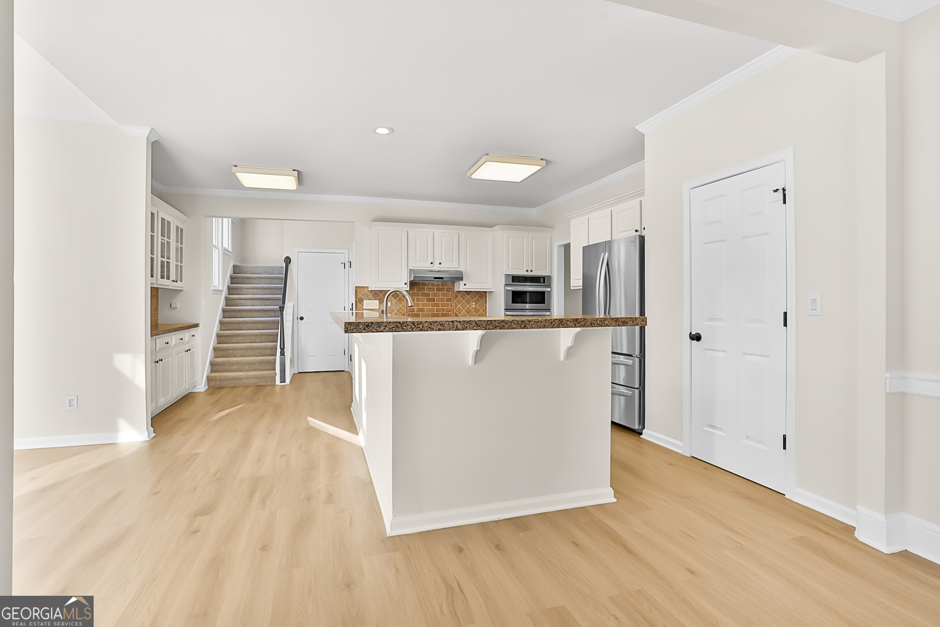160 Streamview Court Fayetteville, GA 30215 - Photo 22 of 55 a view of kitchen with wooden floor