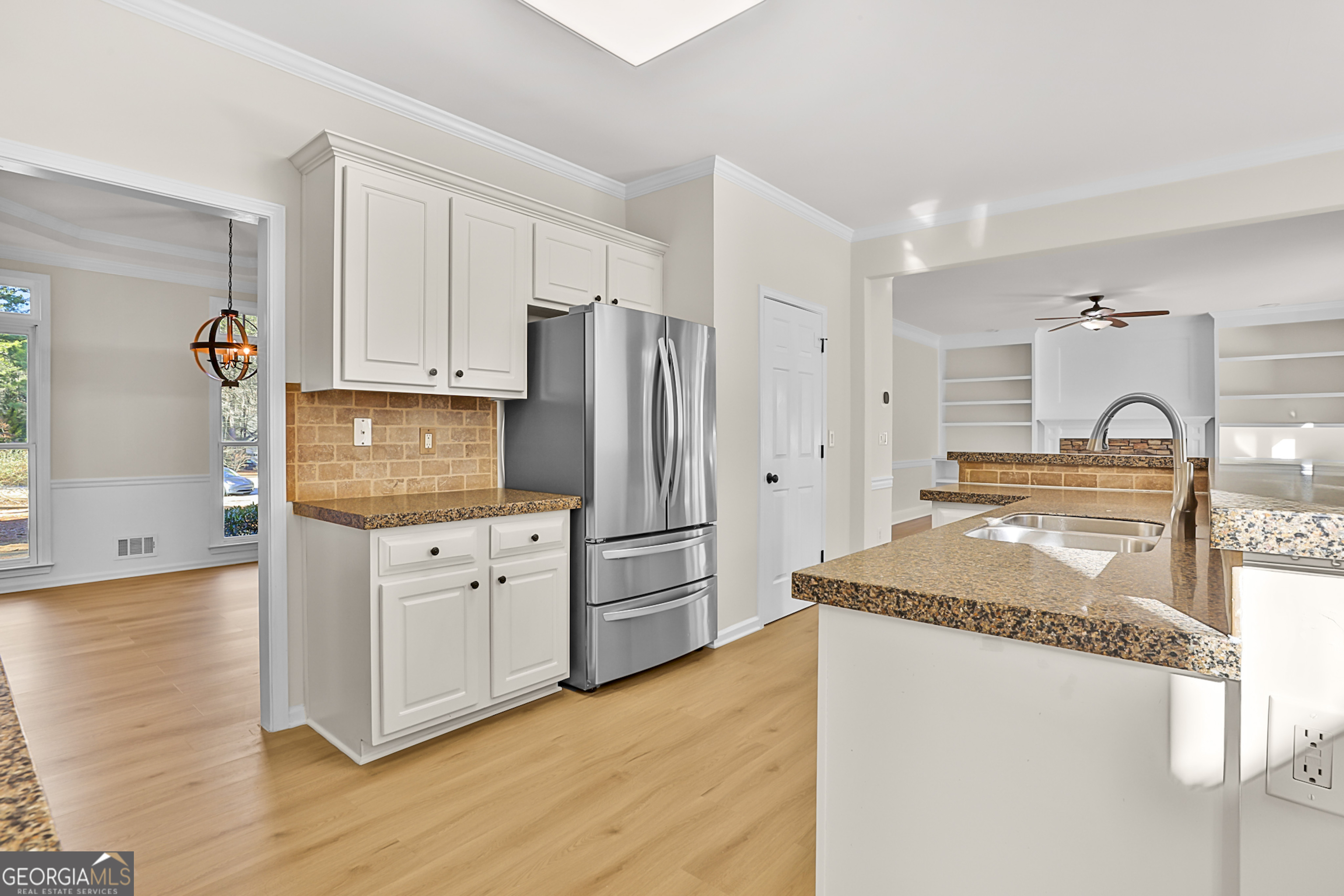 160 Streamview Court Fayetteville, GA 30215 - Photo 28 of 55 a kitchen with stainless steel appliances granite countertop a refrigerator and a stove