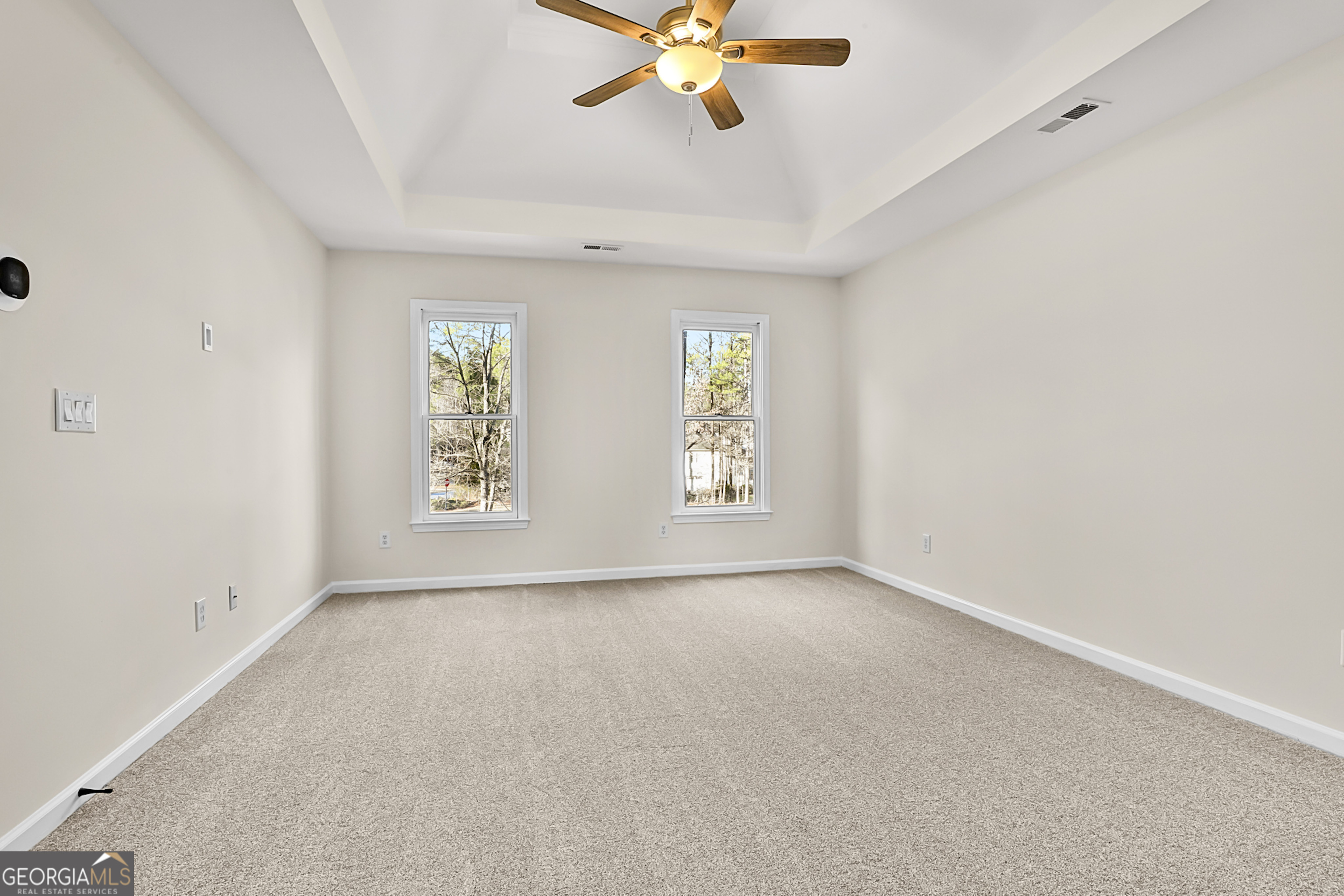 160 Streamview Court Fayetteville, GA 30215 - Photo 33 of 55 an empty room with windows and fan