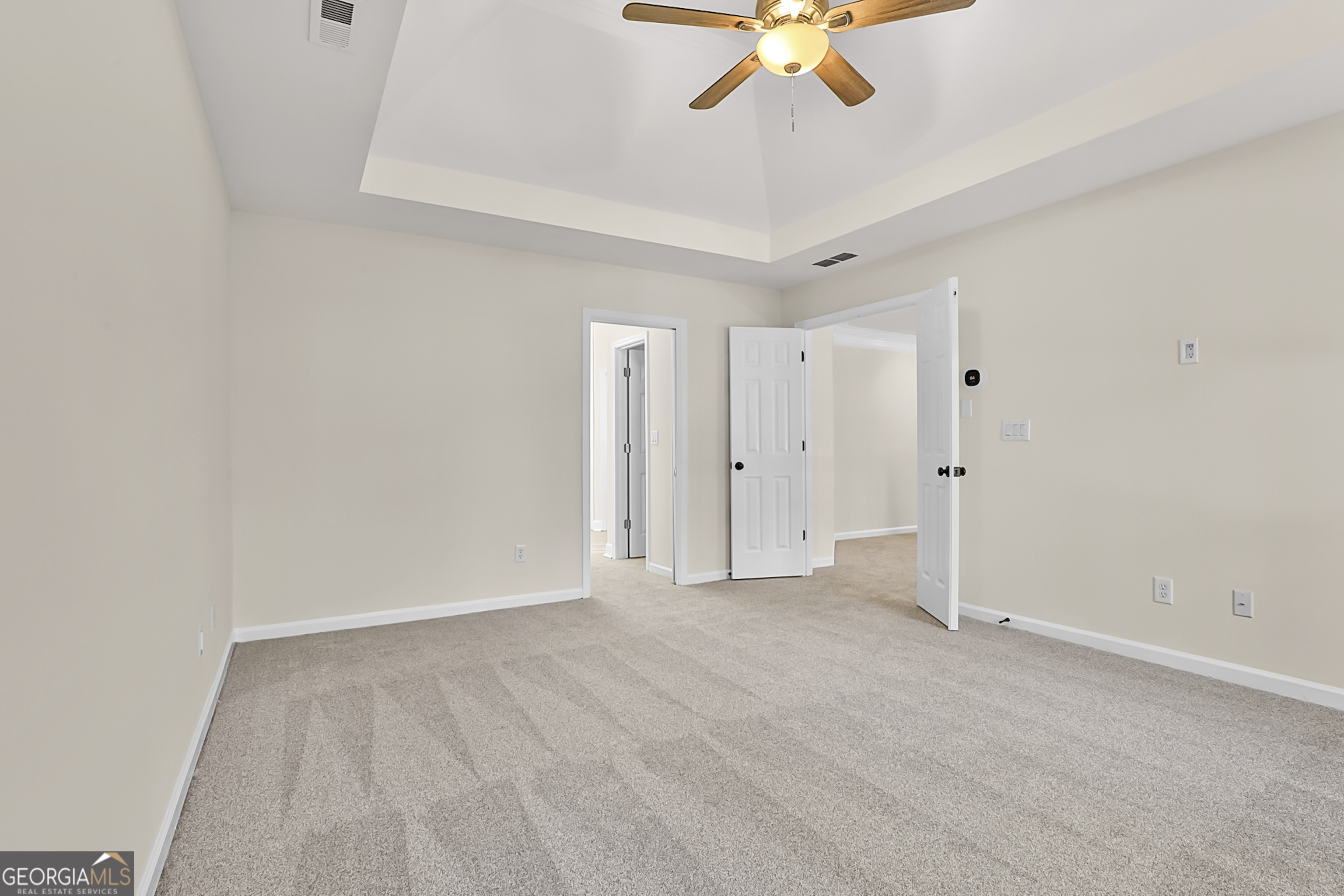 160 Streamview Court Fayetteville, GA 30215 - Photo 34 of 55 a view of an empty room with a chandelier fan