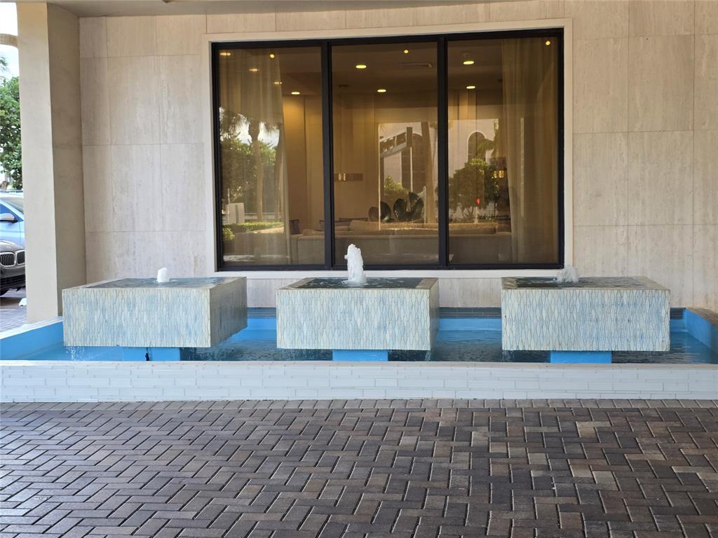 2000 South Ocean Boulevard, Unit 8F Lauderdale-by-the-Sea, FL 33062 - Photo 35 of 35 a living room with couch and large window
