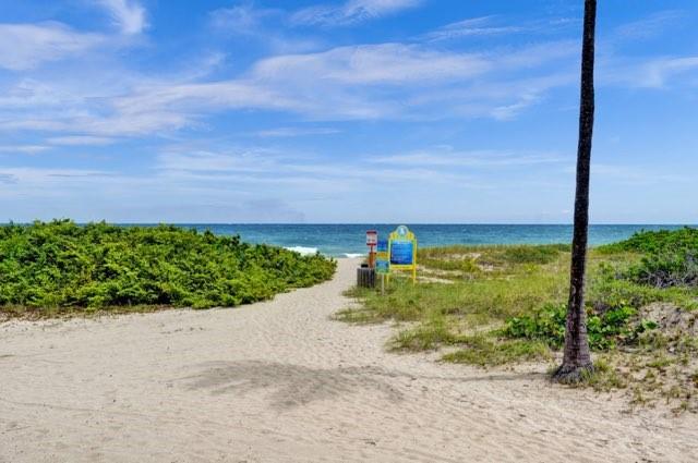 2000 South Ocean Boulevard, Unit 8F Lauderdale-by-the-Sea, FL 33062 - Photo 6 of 35 a view of a lake with a big yard