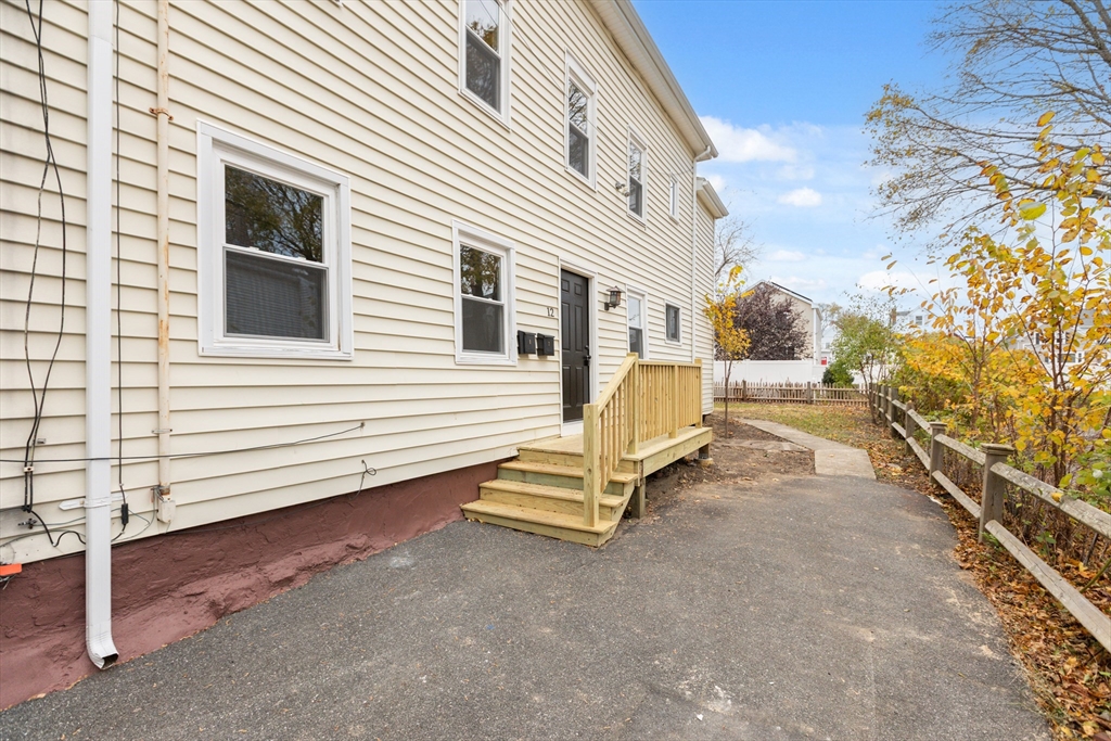 12 Thorndike Street Salem, MA 01970 - Photo 11 of 14 a view of a house with a yard