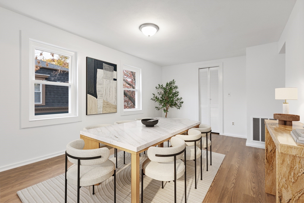 12 Thorndike Street Salem, MA 01970 - Photo 6 of 14 a view of a dining room with furniture and wooden floor