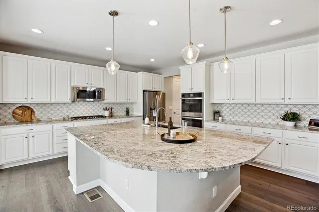 $835,000 | 8102 Adams Fork Avenue, Littleton, CO 80125