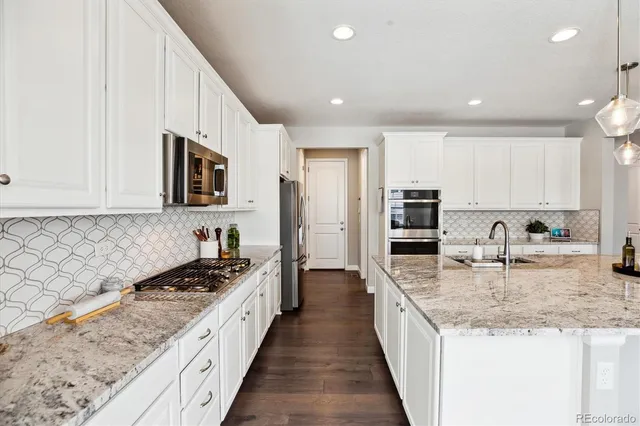 $835,000 | 8102 Adams Fork Avenue, Littleton, CO 80125