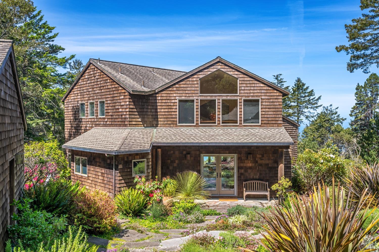 35148 Crows Nest Drive The Sea Ranch, CA 95497 - Photo 11 of 94 a front view of a house with garden