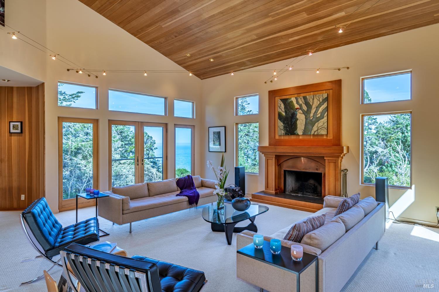 35148 Crows Nest Drive The Sea Ranch, CA 95497 - Photo 15 of 94 a living room with furniture large window and a fireplace