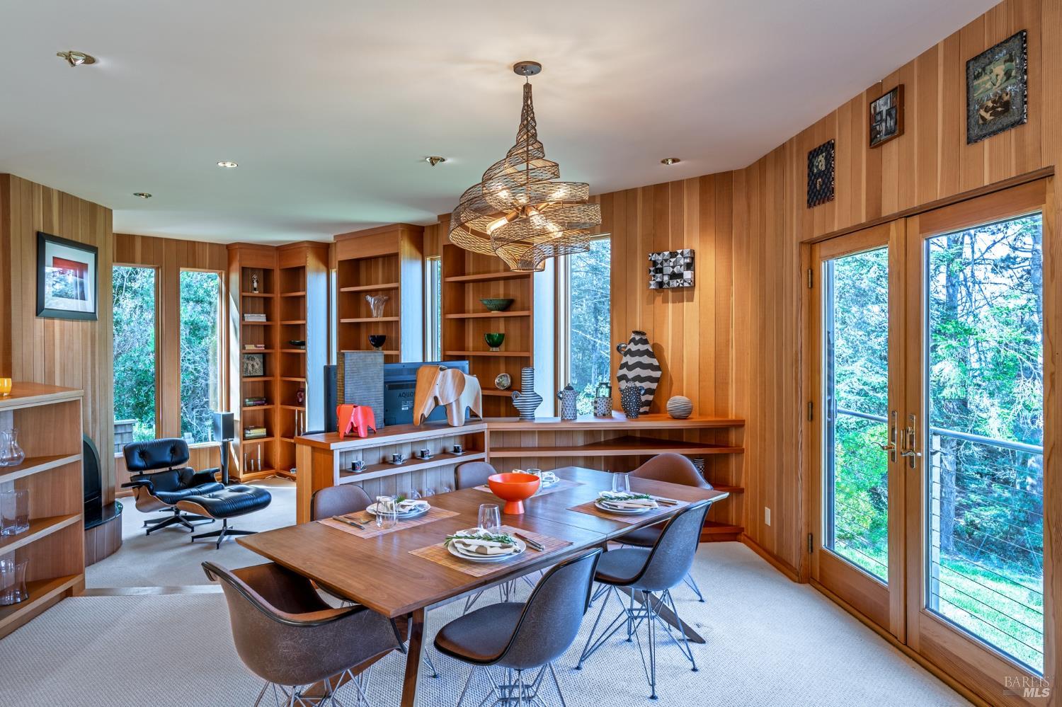 35148 Crows Nest Drive The Sea Ranch, CA 95497 - Photo 22 of 94 a view of a dining room with furniture large windows and wooden floor