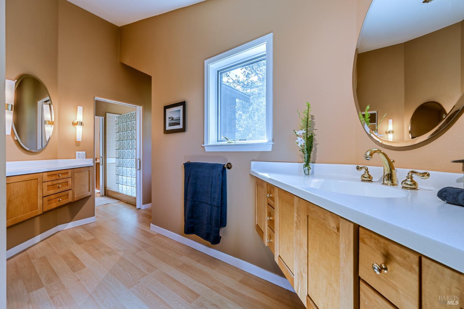 35148 Crows Nest Drive The Sea Ranch, CA 95497 - Photo 51 of 94 a spacious bathroom with a double vanity sink and a mirror