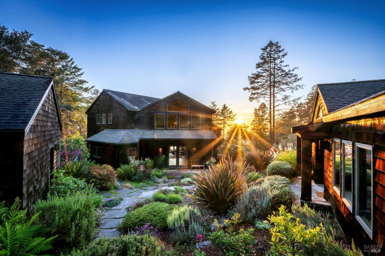 35148 Crows Nest Drive The Sea Ranch, CA 95497 - Photo 57 of 94 a view of a house with a yard and potted plants