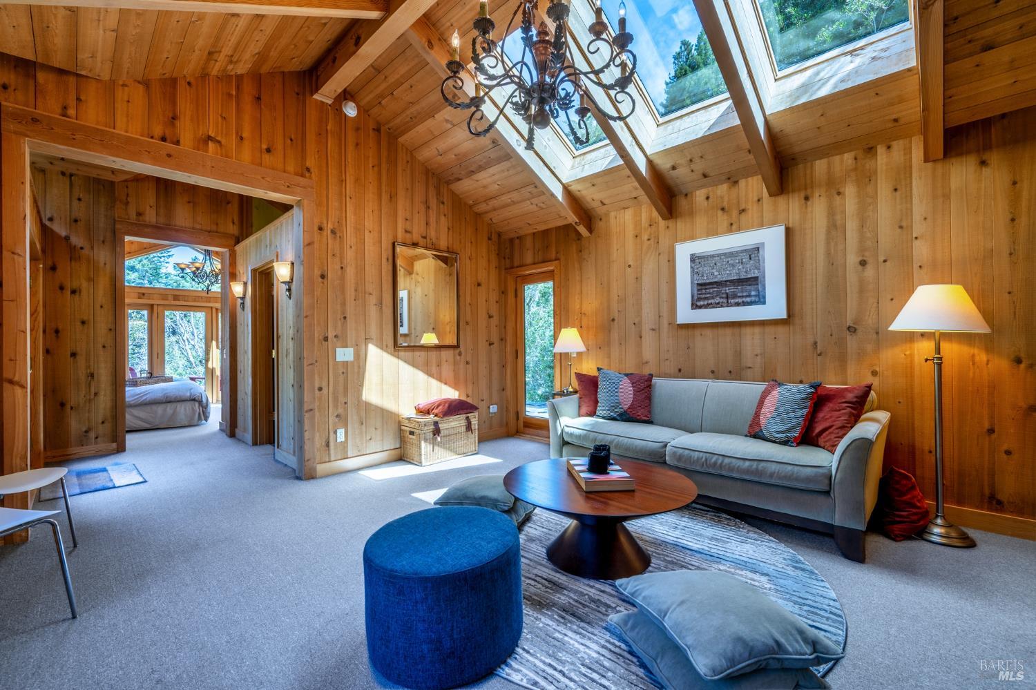 35148 Crows Nest Drive The Sea Ranch, CA 95497 - Photo 63 of 94 a living room with furniture a lamp and a window