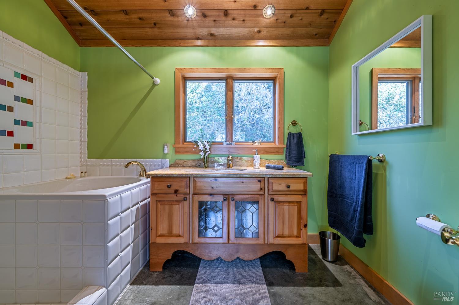 35148 Crows Nest Drive The Sea Ranch, CA 95497 - Photo 64 of 94 a spacious bathroom with a double vanity sink a mirror and a bathtub