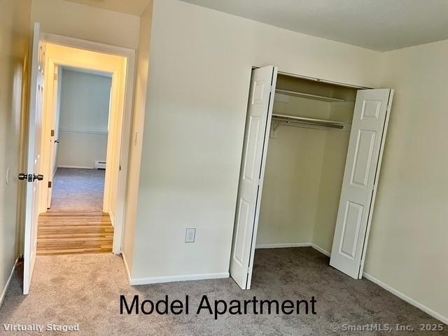 100 Norton Park Road, Unit 1E1 Plainville, CT 06062 - Photo 13 of 14 wooden floor with a bathroom