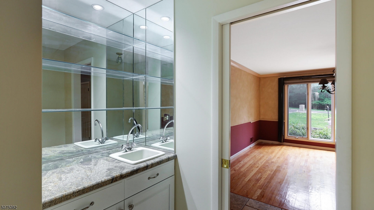 17 Adams Road Bridgewater, NJ 08836 - Photo 11 of 25 a bathroom with a granite countertop sink and a mirror