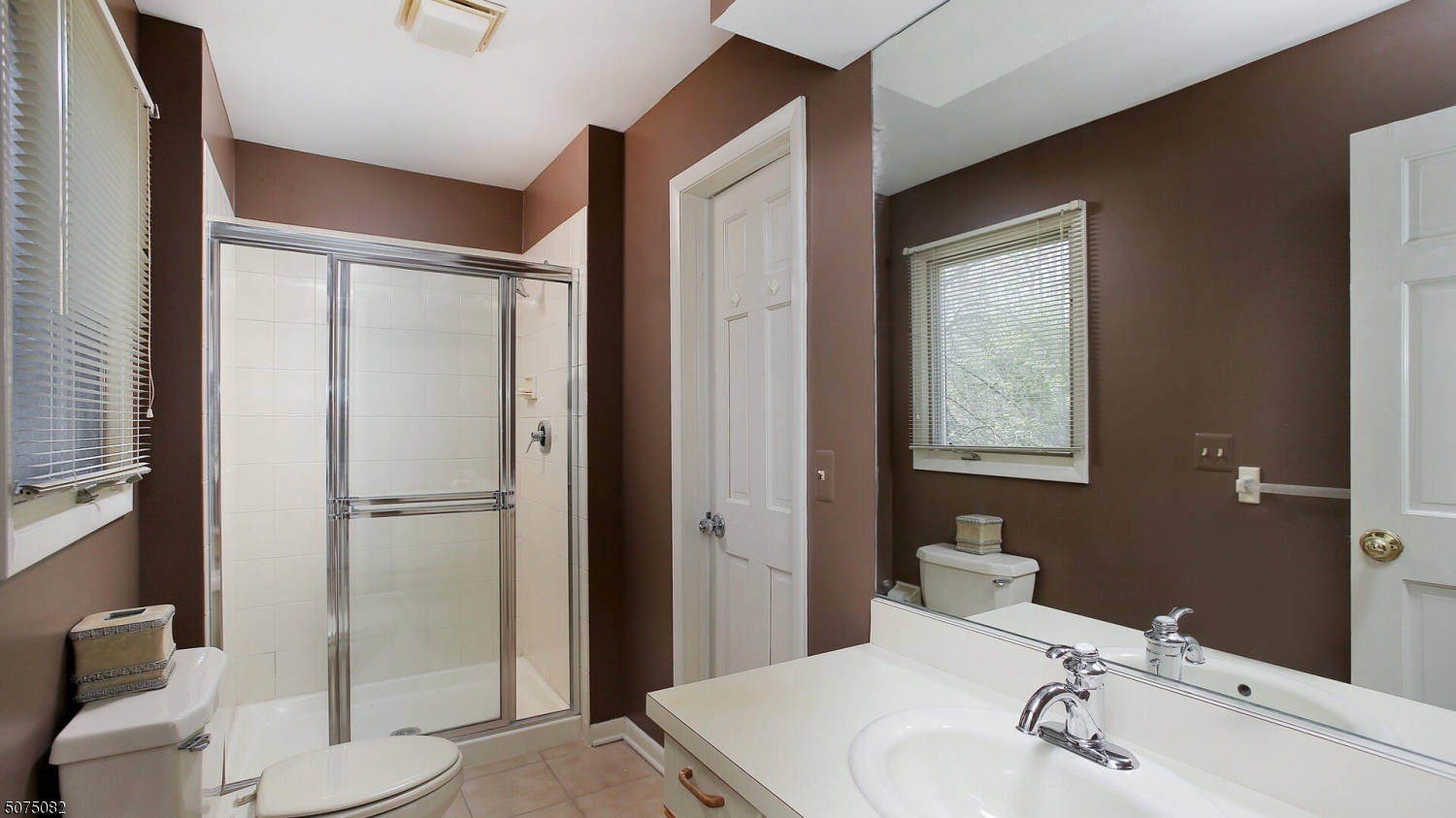 17 Adams Road Bridgewater, NJ 08836 - Photo 12 of 25 a bathroom with a sink a toilet and shower