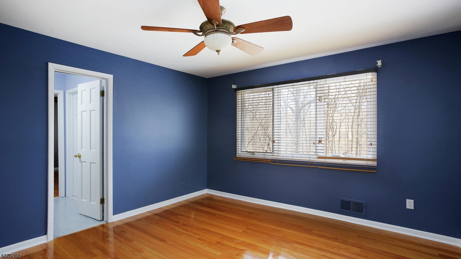 17 Adams Road Bridgewater, NJ 08836 - Photo 14 of 25 a view of an empty room with window and a chandelier fan