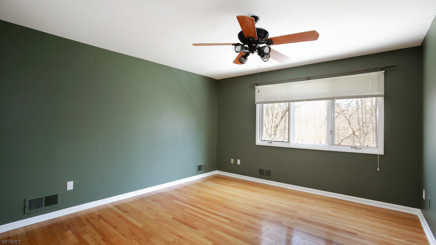 17 Adams Road Bridgewater, NJ 08836 - Photo 17 of 25 a view of a room with a ceiling fan and a window