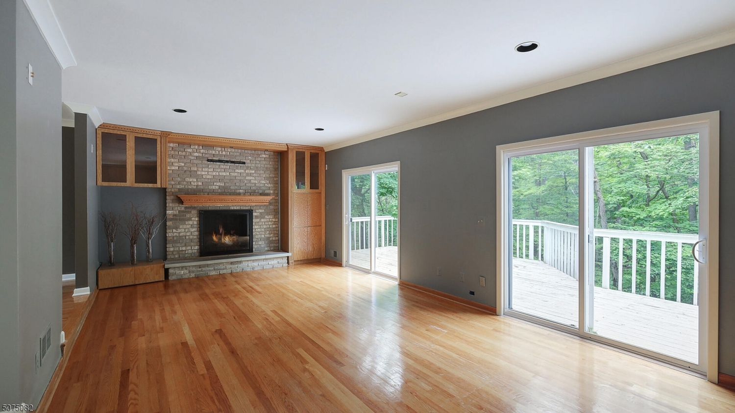 17 Adams Road Bridgewater, NJ 08836 - Photo 6 of 25 a view of an empty room with a fireplace and a window