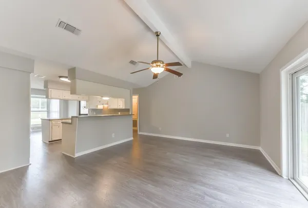 a view of a kitchen with a sink and dish washer