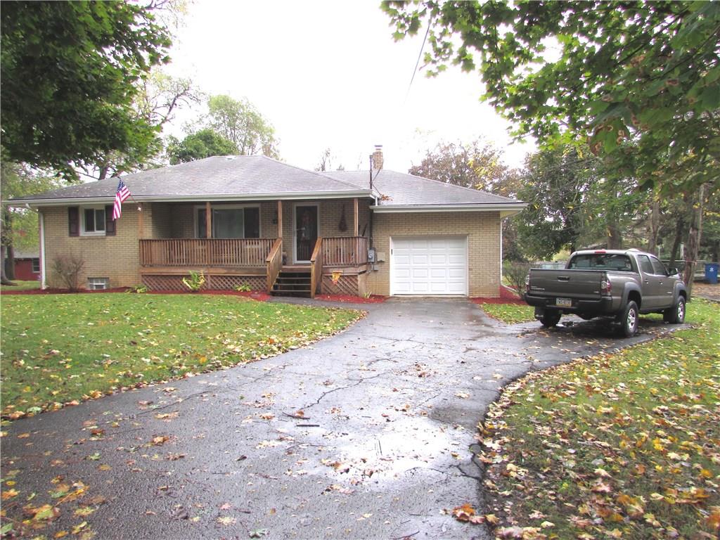 411 Beech Road Plum, PA 15239 - Photo 2 of 25 It sits on a Fantastic almost Acre Level Lot with a Covered Front Porch