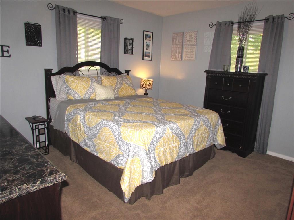 411 Beech Road Plum, PA 15239 - Photo 16 of 25 Professionally Cleaned Neutral Toned Carpeting & Freshly Painted Walls are found in the Master Bedroom.