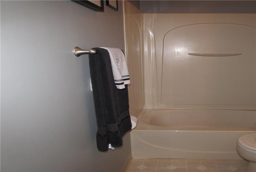 411 Beech Road Plum, PA 15239 - Photo 19 of 25 Notice the Modern Colors & the Shiny Shower & Tub Insert.