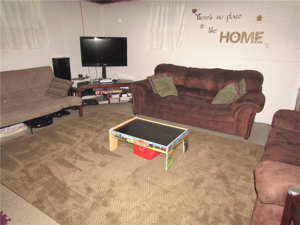 411 Beech Road Plum, PA 15239 - Photo 22 of 25 There is a space in the lower level that is perfect as a Family Room & another space that can be made into a Game Room / Play Room