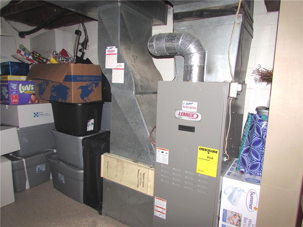 411 Beech Road Plum, PA 15239 - Photo 24 of 25 The Utility Area, hosting the Included Washer & Newer Dryer, and the Newer Furnace can be found behind a curtain