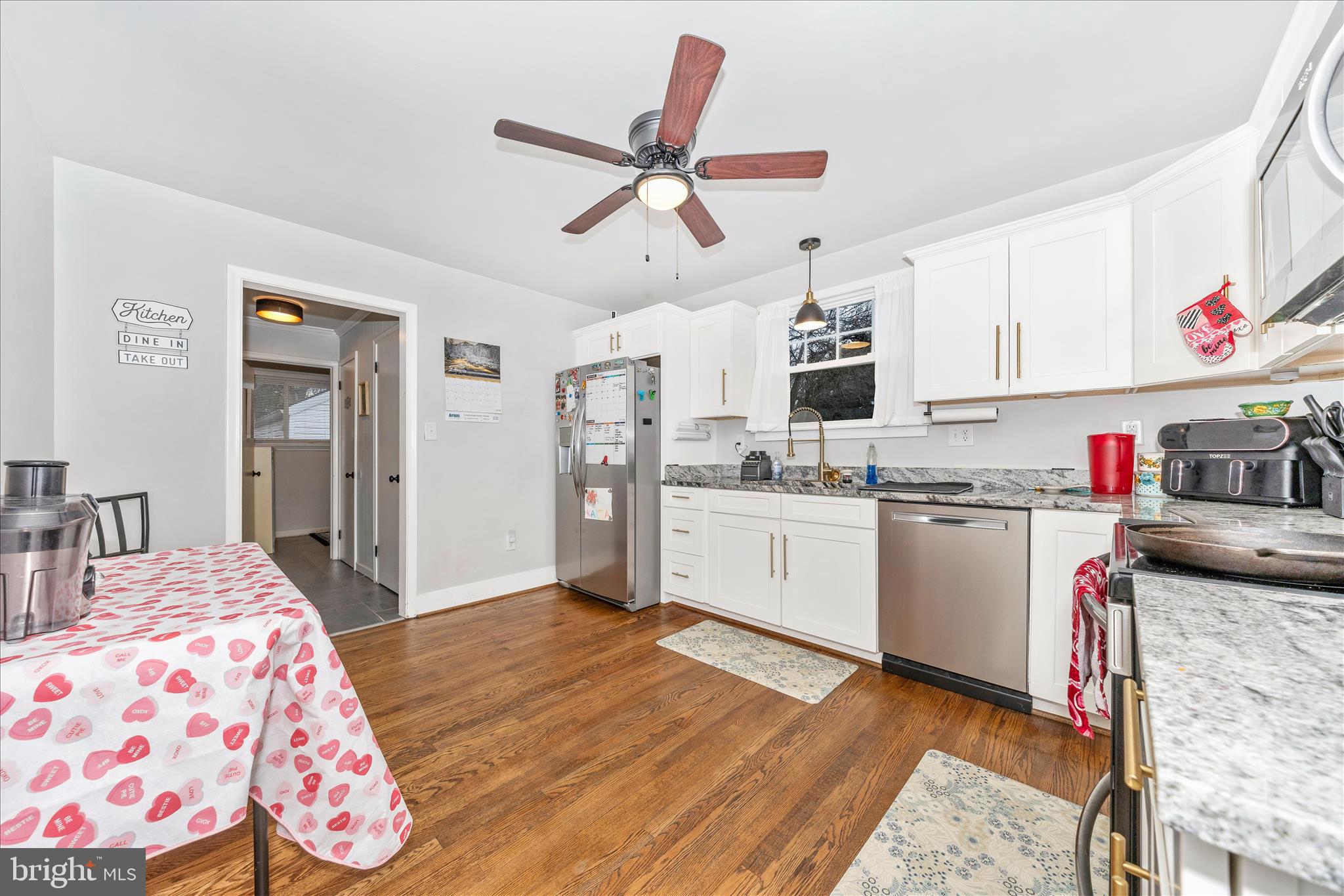 18826 Preston Road Hagerstown, MD 21742 - Photo 11 of 60 a kitchen with a sink cabinets and window