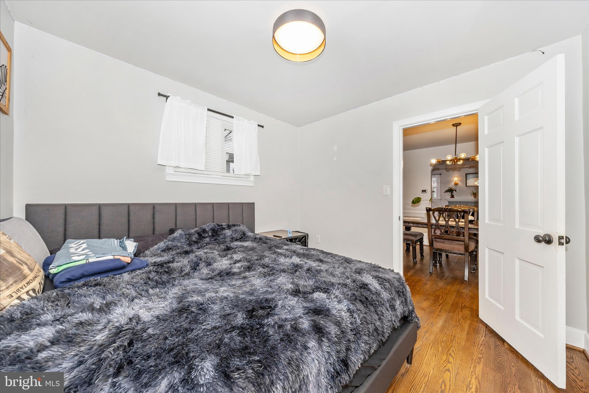 18826 Preston Road Hagerstown, MD 21742 - Photo 19 of 60 a bed room with a bed and a chair